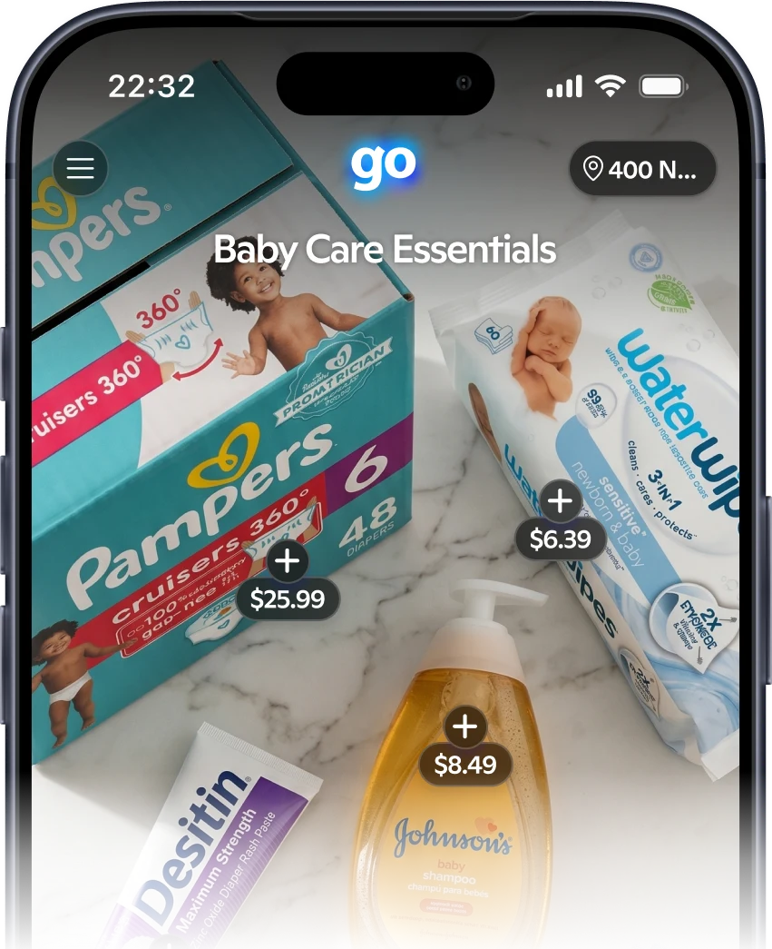Phone showing the go app with a Baby Care Essentials cart of Pampers, water, and skincare